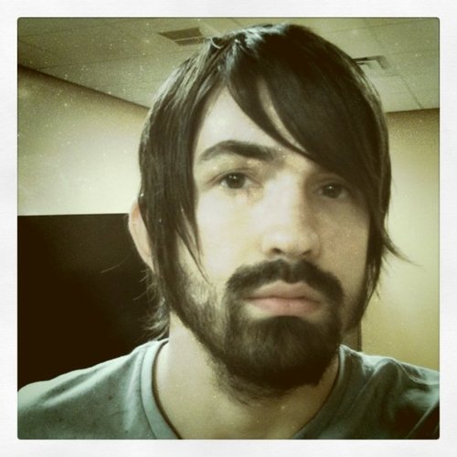 My hair is getting long. Dig it. (Taken with instagram)